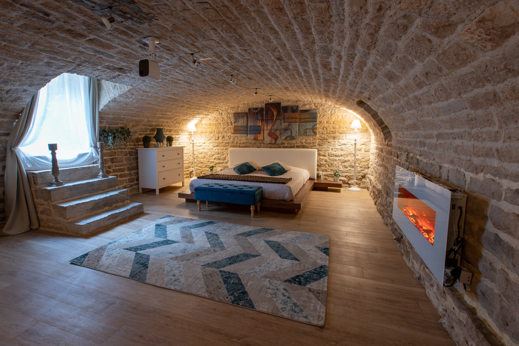L'Expérience Bien Être - Chambre spacieuse avec un design élégant et minimaliste